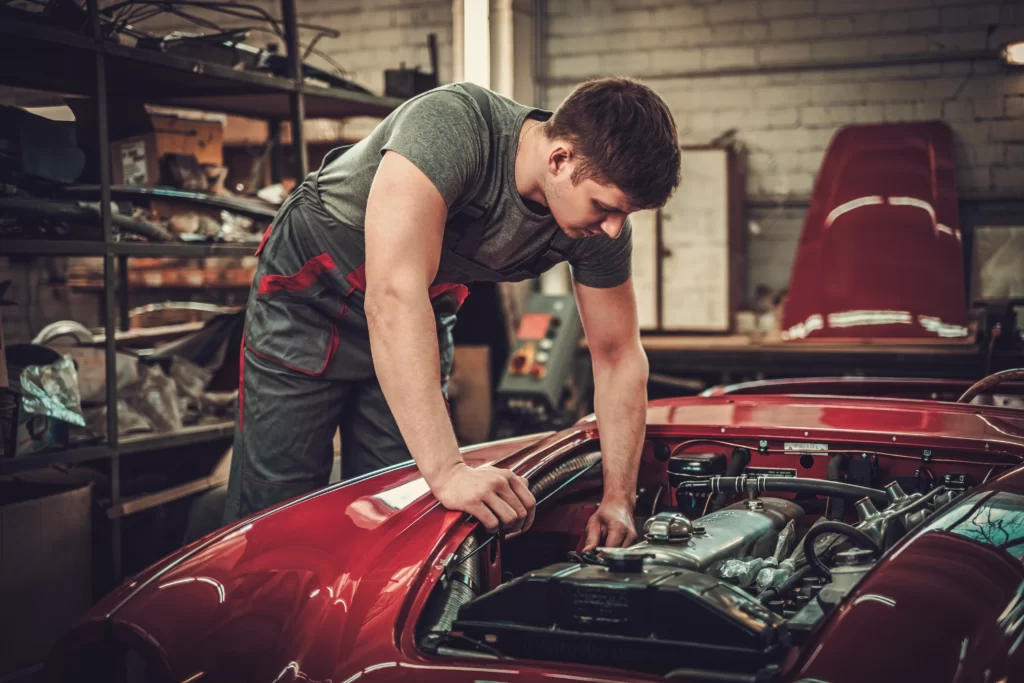 Mechanic working on car-tune up Lebanon, IL